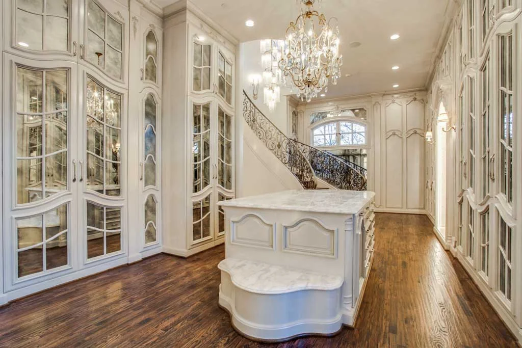 Remodel: stunning home makeover in Dallas by Desco Fine Homes creates an exquisite master closet and spa retreat in this Preston Hollow home.